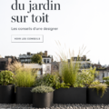Jardin sur le toit luxuriant avec différentes plantes vertes et une vue urbaine.
