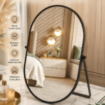 Miroir de bureau ovale avec cadre en métal noir dans un bureau élégant